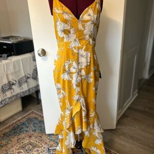 Asymmetrical yellow floral flirty spaghetti strap sundress